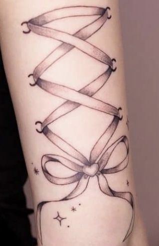 Corset Tattoo Design, Ribbon Back Tattoo, Corset Bow Tattoo, Corset Tattoo Leg, Gothic Bow Tattoo, Lace Bow Tattoo, Ribbon Tattoo Designs, Bow Tattoo Thigh, Learning Tattoo