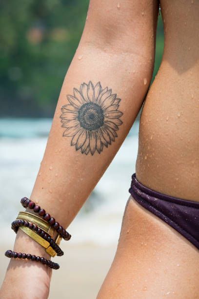 Back Of Neck Sunflower Tattoo, Tattoo Sunflower Arm, Sun Son Tattoo, Sunflower Tattoo Inner Arm, Sunflower Tattoo Bicep, Fine Line Sunflower Tattoo Forearm, Elbow Sunflower Tattoo, Sunflower Tattoo Back Of Arm, Western Sunflower Tattoo