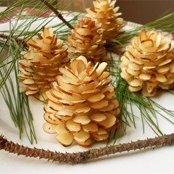 Our Test Kitchen suggests this clever way of dressing up any winter dessert. Make these 'pinecones' when you have some time, then use--and reuse--them on a variety of desserts...or even on a pretty plate piled with candies. Woodland Theme Food Ideas Snacks, Pinecone Cheeseball, Almond Pinecones, Woodland Theme Cake, Table La, Yule Log Recipe, Yule Logs, Chocolate Yule Log, Yule Log Cake