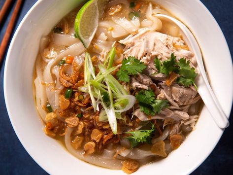 Handmade noodles, a rich and aromatic broth, and loads of flavorful toppings combine for a spectacular bowl of Lao chicken-noodle soup. Khao Piak, Laos Recipes, Chili Season, Lao Recipes, Noodle Float, Handmade Noodles, Asian Soups, Cilantro Chicken, Laos Food