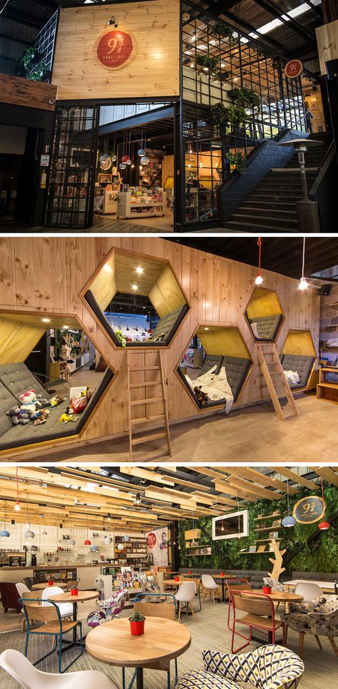 This Cafe And Bookstore Has Hexagon Shaped Hideaway Spaces Cafe And Bookstore, Bookstore Cafe, Coffee Shop Design, Cafe Interior Design, Restaurant Interior, Cafe Interior, Cafe Design, Commercial Design, Commercial Interiors