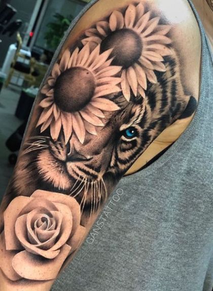 Tiger and Flowers |Sun Flower & Rose #tattoosforwomen #tattooideas Half Leopard Face Tattoo, Tiger And Flowers, Tiger Tattoo Sleeve, Backpiece Tattoo, Animal Sleeve Tattoo, Back Piece Tattoo, Dragon Sleeve Tattoos, Irezumi Tattoos, Shoulder Tattoos