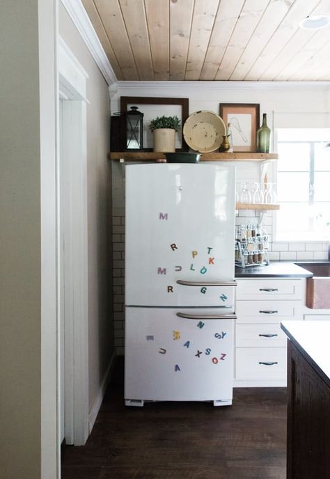 What Your Fridge Decor Reveals About Who You Really Are — Happy at Home | The Kitchn Open Shelves Above Refrigerator, Open Shelf Over Fridge, Open Shelving Over Fridge, Shelving Above Fridge Open, Above Refrigerator Storage Open Shelves, Open Shelves Over Refrigerator, Shelves Above Refrigerator Ideas, Awkward Space Above Fridge, Open Space Above Fridge