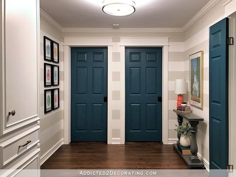 Striped Entryway, Interior Door Paint Colors, Hallway Remodel, Painted Bedroom Doors, Striped Hallway, Blue Interior Doors, Yellow Hallway, Interior Door Color, Interior Door Colors