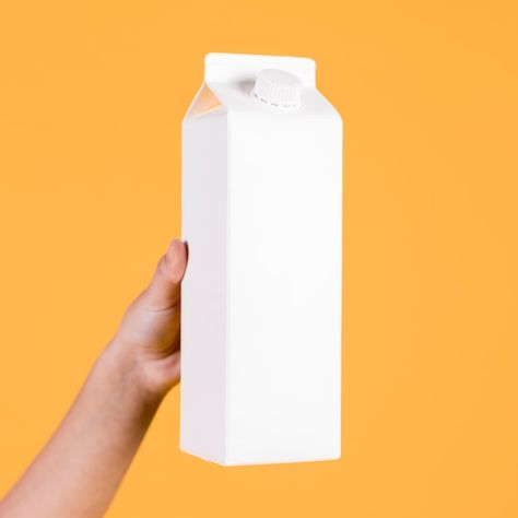 Free photo human hand holding white tetr... | Free Photo #Freepik #freephoto #hand-bottle #milk-box #milk-pack #tetra-pack Hand Template, Tetra Pack, Milk Box, Milk Carton, Human Hand, Hand Holding, Milk Bottle, Yellow Background, Drawing Reference Poses