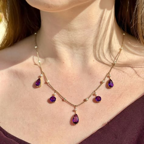 New in! A gorgeous antique Victorian amethyst pearl necklace adorned with five droppers set with round and pear-cut amethysts ranging from 1.8 – 3ct each. They have a luxurious deep-purple hue that is complemented perfectly by nineteen bright white pearls set above and along the length of the chain. The chain and droppers are fashioned in 15ct gold and fitted with a new 9ct ring clasp. It dates to the late 19th Century would be perfect for a glamorous evening do. Get it with 30% off when y... Amethyst Jewelry Necklace, Purple Jewellery, Preppy Jewelry, Jewelry Purple, Fairy Jewelry, Wrist Jewelry, Purple Jewelry, Jewelry Accessories Ideas, No Code