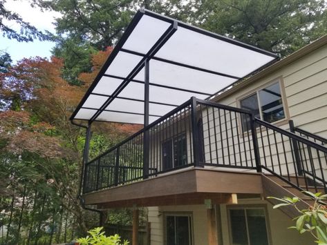 Trex deck with Acrylite patio cover | Deck Masters, LLC Trex Spiced Rum, Patio Covers, Trex Deck, Patio Cover, Covered Decks, Spiced Rum, Composite Decking, Covered Patio, Railing