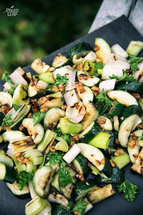 Grilled Zucchini And Leeks With Herb Dressing - Dive into this zucchini and leek-filled side dish lightly coated in an olive oil herb dressing topped with toasted walnuts. Herb Dressing Recipe, Herb Dressing, Leek Recipes, Paleo Sides, Csa Recipes, Fit Cargo Pants, Sides Veggies, Grilled Zucchini, Toasted Walnuts