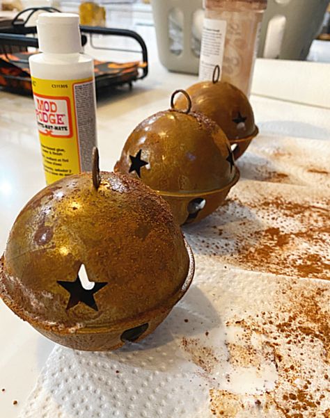 rusty bell technique How To Make Jingle Bells Rusty, Rusty Bells Crafts, How To Make Metal Look Rusty, Bell Hanging Ideas, How To Make Rusty Bells, Rusty Christmas Ornaments, How To Rust Jingle Bells, Using Bells In Christmas Decor, Rusty Christmas Decor