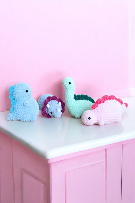 Welcome to our crochet world where imagination meets creativity! Craft your own charming Triceratops, Brachiosaurus, Tyrannosaurus, and Stegosaurus with our no-sew amigurumi patterns.

**This is NOT the finished product. This is just the crochet pattern (PDF) to create your own Crochet Triceratops, No Sew Amigurumi, Crochet World, No Sew, Jurassic Park, Crochet Animals, Stuffed Toys Patterns, Amigurumi Crochet, Amigurumi Pattern