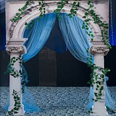 Photo booth idea:  Blue curtain w/ greenery.  Maybe we can make cardboard column arch?   Pose with bowl of grapes and vases in the background. Prom Photo Backdrop, Greek Party Decorations, Greek Wedding Theme, Greek Party Theme, Photo Backdrop Ideas, Greece Party, Prom Planning, Greek Garden, Greek Decor