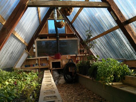 Timber Frame Swing Set Repurposed Into An Awesome Underground Greenhouse… | http://www.ecosnippets.com/gardening/swing-set-repurposed-into-underground-greenhouse/ Underground Greenhouse, Cheap Greenhouse, Aquaponics Greenhouse, Best Greenhouse, Green House Design, Backyard Swings, Floor Heating Systems, Indoor Greenhouse, Greenhouse Interiors