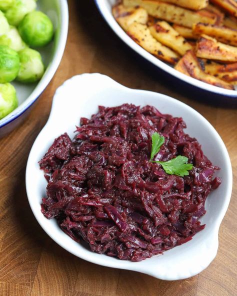 This deeply spiced braised red cabbage with apple and balsamic vinegar is an easy vegan and gluten-free side dish that pairs perfectly with winter comfort food and is a must for Christmas dinner! It can also be made ahead and stored in the fridge or freezer and re-heated on the day for ultimate convenience. #braisedredcabbage #christmasredcabbage #vegansides #veganchristmas #veganredcabbage #glutenfreesides #glutenfreechristmas Braised Red Cabbage And Apples, Cabbage With Balsamic Vinegar, Layered Potato Bake, Red Cabbage With Apples, Vegetable Pot Pies, Braised Red Cabbage, Layered Potato, Braised Cabbage, Winter Meals