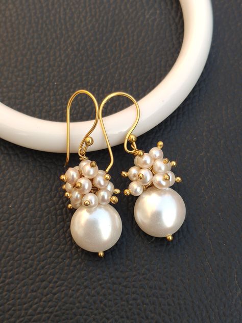 You will receive Beautiful  1 pair of Shell Pearl With Natural Fresh Water Pearl Cluster Earring Gold Earring Bridal Pearl Earrings Statement Wedding Earrings For Women.  Earring Size: 46 mm Long. Light weight comfortable to wear. Statement Wedding Earrings, Handmade Earings, Pearl Gold Earrings, Bridal Pearl Earrings, Cluster Earring, Earring Bridal, Diy Wire Earrings, Statement Earrings Wedding, Pearl Cluster Earrings