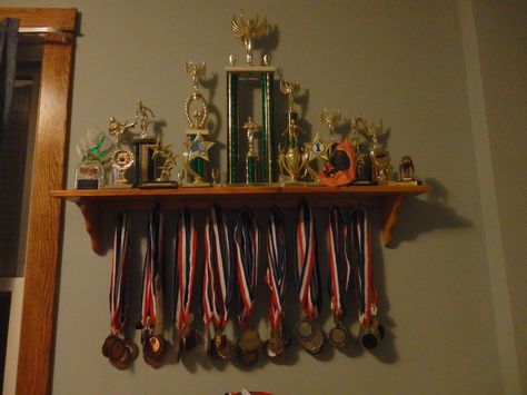 One way to display lots of medals and trophies Trophies And Medals Aesthetic, Medals And Certificates Aesthetic, School Medals Aesthetic, Medals Aesthetic, Medals And Trophies, 1000 Peso Bill Philippines, Football Medals, Boxer Aesthetic, Trophy Display