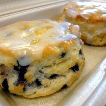 Blueberry Biscuits  Biscuits:    2  Cups Flour    1  Cup milk (cold)    ⅓  Cup sugar    5  T of butter (cold or frozen)    4  tsp baking powder    1  tsp salt    3  oz of blueberries (fresh or dried)    Glaze:    1  Cup of powdered sugar    ⅛  Cup of water    1  tsp of vanilla    ½  tsp of lemon juice Berry Biscuits, Bo Berry Biscuits, Blueberry Biscuits, Breakfast And Brunch, Blue Berry, What's For Breakfast, Blueberry Recipes, Good Eat, Blueberry Muffins