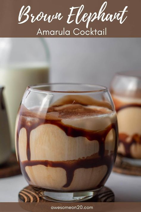 This Brown Elephant Amarula Cocktail is a bit indulgent, a bit sweet, and a bit deep. Add a drizzle of chocolate syrup, and it might as well be dessert. It's about to become your new favorite. #cocktail #amarula #kahlua #mixeddrink #dessertcocktail Brown Drinks For Color Party, Witchy Recipes, Celebrating Yule, Creamy Cocktails, 21 Diner, Sparkling Cocktail, Boozy Desserts, Slow Cooker Desserts, Cocktail Desserts