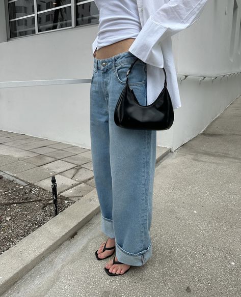 @victoriatornegren styles her loose low waist jeans for a more well dressed look by adding some simple black heels and black accessories. A great way to elevate your basic white shirt🤍tap to shop the look. #cubusofficial Low Waist Black Jeans, Black Fitted Low-cut Top, Black Low Waisted Jeans, Levi’s Low Loose Jeans, Low Rise Relaxed Fit Jeans, Simple Black Heels, Low Waist Jeans, Black Accessories, Black Heels