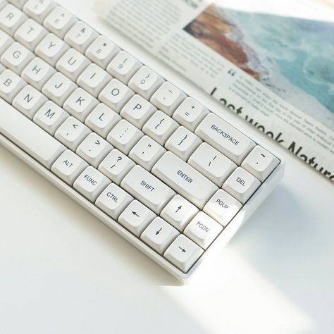 Please accept this white minimalism. Different from the cliche black, this white is clear, natural, fresh, and clean. It is undoubtedly an excellent match for typing or gaming, allowing you to isolate all impurities and focus on this moment on the keyboard only. #minimalist #white #keycap #keycaps #keycapset #mechkeyboard #mechkeyboards #officelife #officespace #officedecor #pcsetup #gamingsetup #gamingsetups #gamingsetupidea #keyboard #keycapss White Mechanical Keyboard, White Keycaps, Japanese Minimalist, Key Cap, Key Caps, Minimalist White, Pc Setup, Room Setup, Mechanical Keyboard