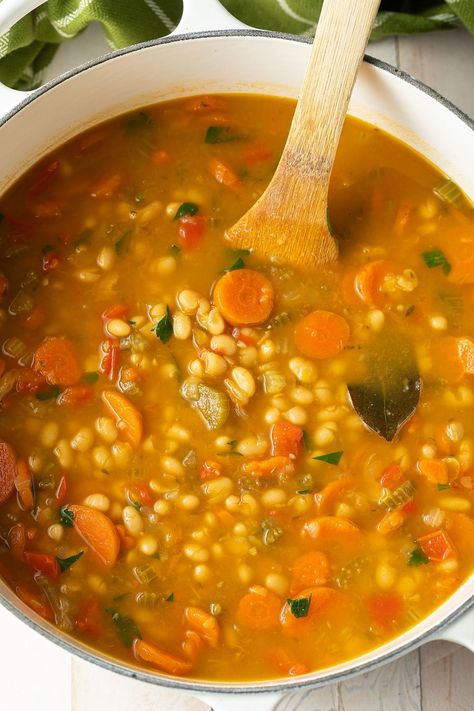 Try our twist on the traditional Navy Bean Soup that you’ve indulged in at your grandmas house. It's packed with veggie and it's glute-free as well. Navy Bean Recipes, Senate Bean Soup, Navy Bean Soup, White Bean Soup Recipes, Bone Soup, Bean Soup Recipe, Carlsbad Cravings, Ham Bone, Navy Bean