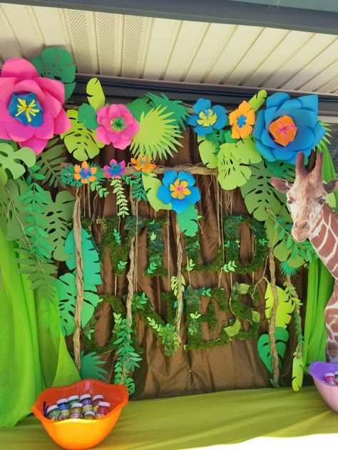 #wildone #partyideas #backdrop #partyideas #backdropideas #wildoneparty #ideasparafiestas #partydecorations #decorideas #backdrop  More items on FB and IG @creationswithgrace Jungle Theme Classroom Decorations, Jungle Crafts, Jungle Theme Classroom, Rainforest Theme, Jungle Decorations, Potpourri Christmas, Jungle Flowers, Hawaiian Party Decorations, Deco Jungle