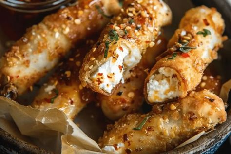 Crispy Oven Fried Feta Rolls with Chili Honey Recipe Flaky Chili Honey Feta Rolls, Feta Rolls With Chili Honey, Fried Feta With Honey, Oven Fried Feta Rolls With Chili Honey, Feta Snacks, Oven Fried Feta Rolls, Fried Feta Rolls, Feta Rolls, Fried Feta