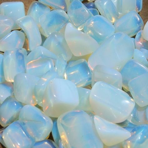 ❤︎ Follow us on Instagram to keep updated on sales and have first dibs on new products @CasparCuriosities ❤︎For your consideration are these small Opalite tumbled stones. These pieces measure .5 to 1 inch, most are around .75 inch. Opalite is a form of glass made with powdered Fluorite and it changes color in different lighting situations.Opalite is thought to enhances intuition and psychic abilities. Improves communication and manifests wealth. Balances emotions and strengthens interpersonal sk