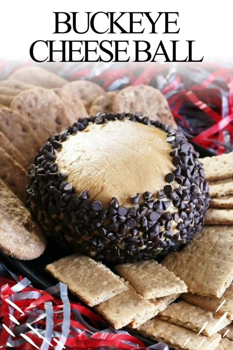 This Buckeye Cheese Ball is the largest buckeye you’ll ever see! Best served with graham crackers or apple slices #PBchocSat #gobucks #OSUvUM #thegame #Buckeyes #OhioState #thespiffycookie #cbusfoodbloggers #dessert Buckeye Cake Pops, Dessert Cheese Ball Christmas, Caramel Apple Cheese Ball, Dessert Cheese Ball Recipes, Dessert Cheese Balls, Dessert Cheeseball Recipes, Sweet Cheeseball Recipes, Buckeye Recipes, Dessert Cheeseball