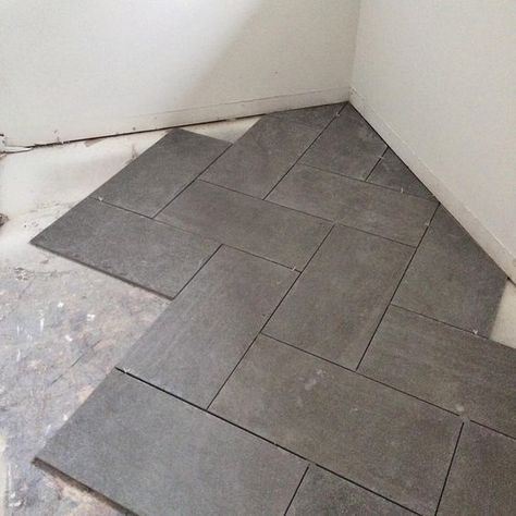 So I decided on a mid range grey, almost cement looking tile, for this room of the house in 12x24" & #herringbone set with light grey grout. This will be a high traffic zone and I wanted something durable, super easy to clean and keep clean! Let's hope it works! #renobystyleberry Gray Bathroom Floor Tile Ideas, Dark Gray Bathroom Floor, Cement Looking Tile, Gray Bathroom Floor Tile, Gray Bathroom Floor, 12x24 Tile Patterns, Bathroom Floor Tile Ideas, 12x24 Tile, Bathroom Grey