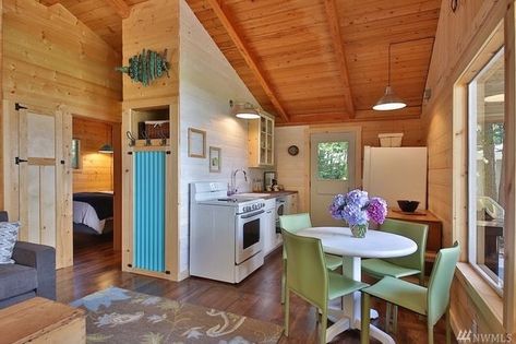 528 Sq. Ft. Langley Cabin Langley Washington, 500 Sq Ft House, Dr Kitchen, Garden Flat, Green Chairs, Tiny House Towns, Waterfront Cabins, Cabin Tiny House, Cabins For Sale