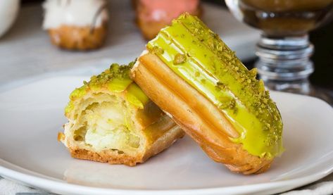 Orange And Pistachio Éclair Authentic Recipe | TasteAtlas Pistachio Eclairs Recipe, Orange Eclairs, Pistachio Eclair, Food References, Bake Ideas, Pastry Cream Recipe, Eclair Recipe, Food Spread, Pistachio Cream