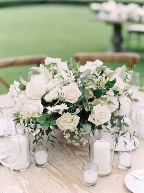 Garden Rose Table Arrangement, Ivory Roses Centerpieces, White Wedding Centerpieces With Greenery, Round Greenery Centerpiece, Compote Arrangement Centerpieces, White Garden Rose Centerpiece, White Wedding Centerpieces Round Table, White And Greenery Wedding Centerpieces Round Table, Green And White Wedding Centerpieces Round Table