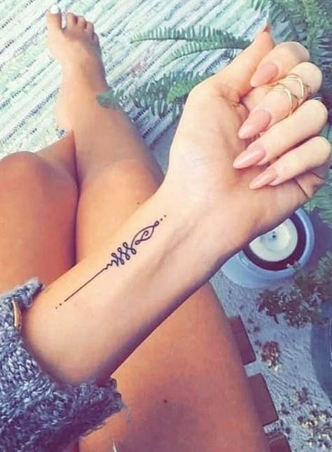 Mini Tattoos Ideas For Girls 30+ to Choose From Small Words Tattoo, Wrist Tattoos Girls, Wörter Tattoos, Yoga Tattoos, Unique Wrist Tattoos, Unalome Tattoo, Meaningful Tattoo Quotes, Strength Tattoo, Small Wrist Tattoos