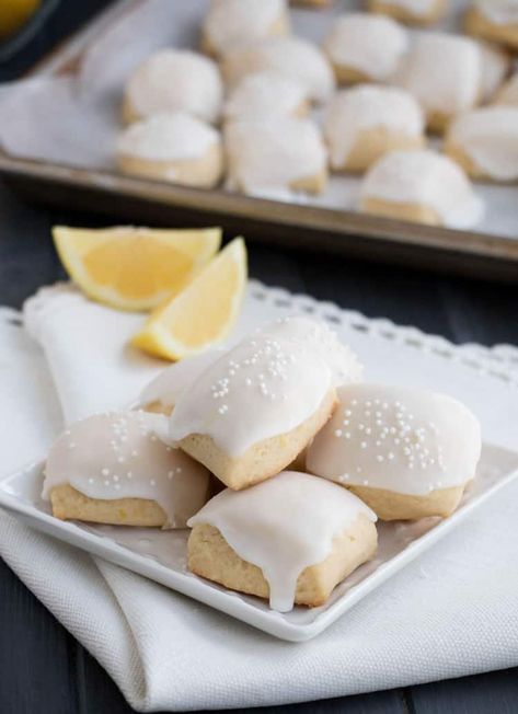 Iced Lemon Pillow Cookies. A soft, petite, pillow shaped cookie, flavored with fresh lemon zest and then coated in fresh lemon icing. A perfect tea cookie! Pillow Cookies Recipe, Pillow Cookies, Lemon Pillow, Tea Cookie, Dessert From Scratch, Citrus Recipes, Lemon Squares, Lemon Icing, Pumpkin Waffles