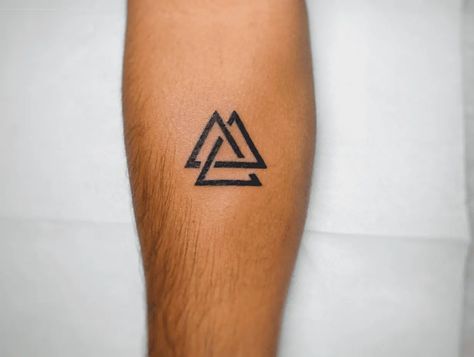 Three Triangle Tattoo Meaning & Symbolism (Christianity) Valknut Tattoo Tripod Tattoo Ideas, Interlocking Triangle Tattoo, Viking Triangle Tattoo, 3 Triangle Tattoo Meaning, Father Son Holy Spirit Tattoo, Two Triangle Tattoo, Three Triangle Tattoo Meaning, Triple Triangle Tattoo, Trinity Tattoo Christian