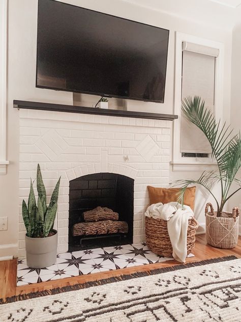 Fireplace Rental Makeover, Peel And Stick Floor Tile Fireplace, Peel And Stick Vinyl Tile Fireplace, Peel And Stick White Brick Fireplace, Fireplace Makeover Stick On Tile, Peel Stick Fireplace Tile, Tile Stickers For Fireplace, Peel And Stick Brick Fireplace, Faux Tile Fireplace