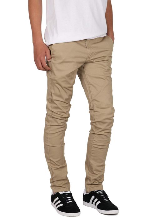 PRICES MAY VARY. Added stretch for maximum comfort Slash pockets at front and welt back pockets Sits below waist, slim through thigh, tapered leg Leg opening 13" (Size 32) Classic four pocket styling with zipper fly and button closure Mersenne Men's Casual Slim Fit Stretch Chino Pants Casual Chinos, Stretch Chinos, Tapered Pants, Fashion Toys, Kids Luggage, Chino Pants, Baby Games, Chinos Pants, Pharmacy Gifts