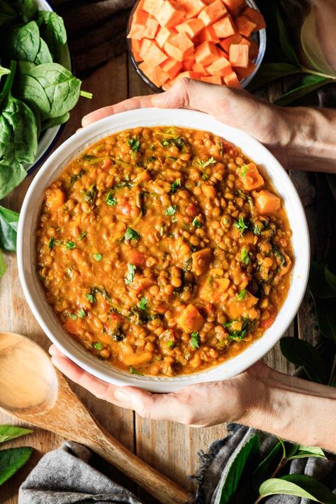 Moroccan lentil stew is a gluten free dinner that's super healthy! This hearty stew is full of sweet potatoes, lentils, turmeric, and vegetables.  Make this healthy stew in your crock pot or on the stovetop and get your clean eating goals back on track fast. Healthy Fall Soups, Lentil Burger, Moroccan Lentil, Healthyish Recipes, Moroccan Lentil Soup, Moroccan Recipe, Lentil Stew Recipes, Vegetarian Lentil Soup, Healthy Stew