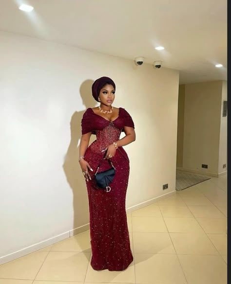 Sharon Ooja Ankara Styles, Gold And Wine Asoebi, Asoebi Styles For Mothers, Chocolate Brown Lace Asoebi, African Dress Wedding Guest, African Modest Dresses, Off Shoulder Aso Ebi Lace Styles, Burgundy Asoebi Lace Styles, Wine Lace Aso Ebi Styles