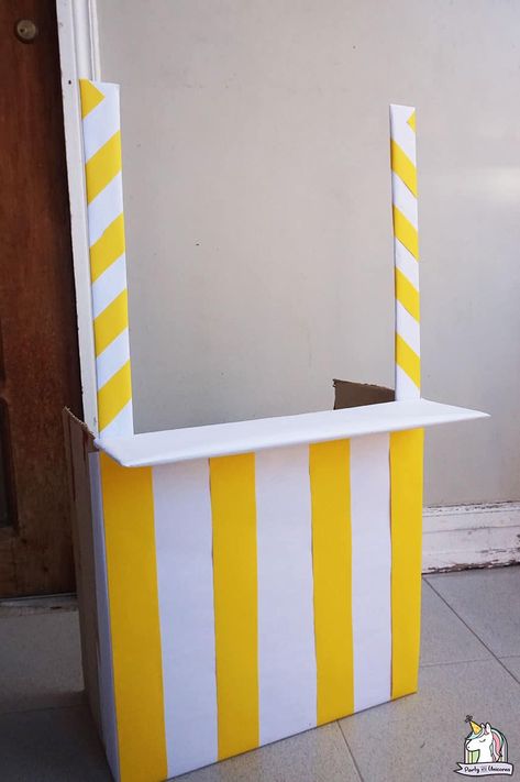 Cardboard Booth Diy, Lemonade Stand Costume, Diy Ticket Booth Cardboard Boxes, Diy Lemonade Stand Cardboard, Lemonade Stand Ideas Diy, Cardboard Lemonade Stand, Lemonade Stand For Kids, Make A Lemonade Stand, Kids Lemonade Stands