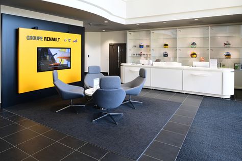 Minoli Tiles - Renault Head Office - Minoli RSN 45 - https://www.minoli.co.uk/car-showrooms/renault-showroom/renault-head-office/ - #Minoli #Minolitiles #Renault #RenaultUK #headoffice #darktile #carshowroom #automotive Automotive Showroom, Showroom Decor, Dark Tile, Luxury Garage, Tv Sets, Office Branding, Car Showroom, Showroom Design, Reception Area