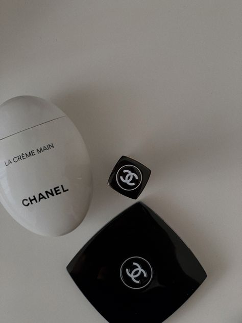 Chanel beauty products: Chanel hand lotion, Chanel compact mirror, Chanel lipstick. Minimalist aesthetic beauty products. Chanel Compact Mirror, Chanel Mirror, Chanel Compact, Skincare Luxury, Marble Wallpaper Phone, Chanel Aesthetic, Glam Aesthetic, Chanel Black And White, Paper Fashion