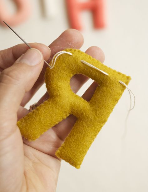 Hand Sewn Felt Alphabet | Purl Soho Felted Letters Diy, Felt Word Garland Diy, Diy Felt Alphabet Fabric Letters, Felt Alphabet Letters Templates, Stuffed Felt Letters, Diy Felt Crafts, Felt Alphabet, Diy Laine, Sewing Felt