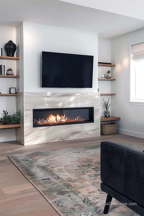 This electric fireplace shines with a gorgeous tiled surround under the TV. It doesn’t stop there, you also get clever storage on the sides. Tv Unit Table, Modern Fireplace Ideas Living Rooms, Living Room Design Boho, Inviting Bedroom, Dream House Living Room, Linear Fireplace, Gas Fireplaces, Electric Fireplaces, Fireplace Built Ins