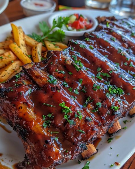 OVEN BAKED RIBS 🍖 Ingredients: 2 racks of pork ribs (baby back or spare ribs) 1/4 cup dry rub (your favorite blend or a mix of paprika, brown sugar, garlic powder, onion powder, salt, and black pepper) 1 cup barbecue sauce (optional, for glazing) Directions: Step 1: Prepare the Ribs Preheat your oven to 300°F (150°C). Remove the membrane from the back of the ribs and pat them dry with paper towels. Rub the dry rub mixture all over the ribs, covering both sides. Let them sit for at lea... Baby Ribs, Beef Back Ribs, Oven Baked Ribs, Eating Food Funny, Baked Ribs, Barbecue Ribs, Healthy Food Dishes, Food Babe, Baby Back Ribs