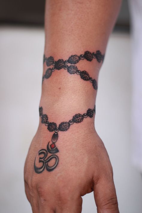 Rudraksh Tattoo Design, Rudraksha Tattoo Design, Indian God Tattoo, Rudraksh Tattoo, Henna Arm Tattoo, Hindi Tattoo, Bracelet Tattoo For Man, Hindu Tattoos, Mahadev Tattoo