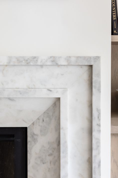 Intricate details on the marble slab fireplace of our Nellie Gail project. Interior Design Fireplace, Granite Fireplace Mantle, Marble And Stone Fireplace, Master Suite With Fireplace, Marble Fireplace Ideas Modern, Carrara Marble Fireplace, Modern Bedroom Fireplace, Porcelain Fireplace Surround, Marble Mantle