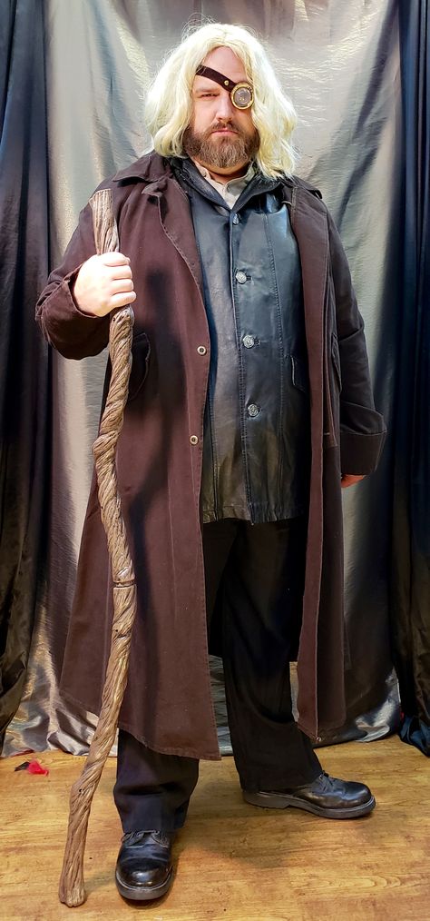 We have this Alastor “Mad-Eye” Moody, from ‘Harry Potter and the Order of the Phoenix.’ This killer Mad Eye Costume is just one Harry Potter Costume Idea we have in stock, all year round. You will find all the Robes, Tunics, weapons, Goggles, wigs & facial hair, and anything you need to create your own Magical Harry Potter Costume or Wizard Attire. Harry Potter Costume Ideas at Dallas Vintage Shop! Dumbledore Costume Diy, Harry Potter Mandrake Costume, Wizard Costume Harry Potter, Mad Eye Moody Costume, Dumbledore Cosplay, Moody Harry Potter, Unusual Harry Potter Costume, Eye Costume, Hogwarts Costume