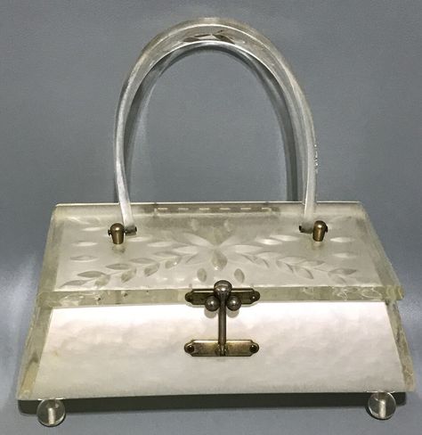 Add a touch of vintage glamour to your look with this stunning Lucite box purse by Charles S Kahn from Miami! The white pearl and flower design is perfect for a casual occasion or an Art Deco inspired outfit. Made in the United States, this original piece is a must-have for any fashion-forward woman! #vintagestyle #lucitepurse #charlesskahn #artdeco #madeinUSA 🌸💼✨ #shopvintage80 #orlandoestateliquidators #shopvintage #eBay #eBayStore #CharlesSKahn #Lucite #Purse #ArtDeco #Women #eBaySeller ... Lucite Purse, Diy Purses, Dream Bags, Box Purse, Purse White, Diy Purse, Vintage Purses, Vintage Lucite, Pearl Flower