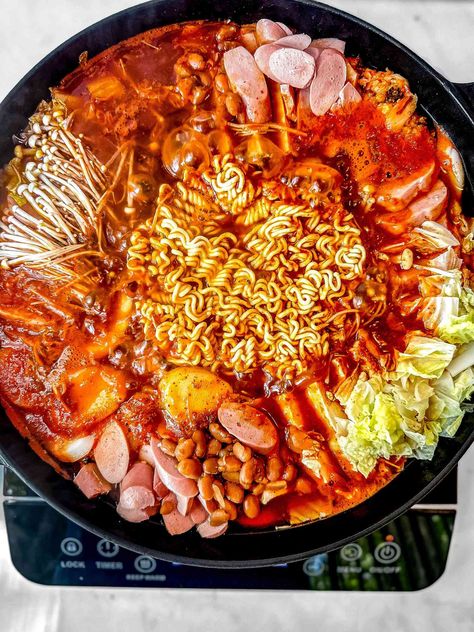 I Make My Mom’s Korean Army Base Stew When I’m Craving Comfort Army Base Stew Recipe, Army Stew Recipe, Budae Jjigae Recipe, Army Base Stew, Jjigae Recipe, Budae Jjigae, Korean Army, Pork N Beans, Army Base